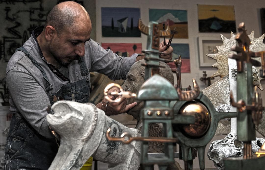 Sadegh Adham in his studio